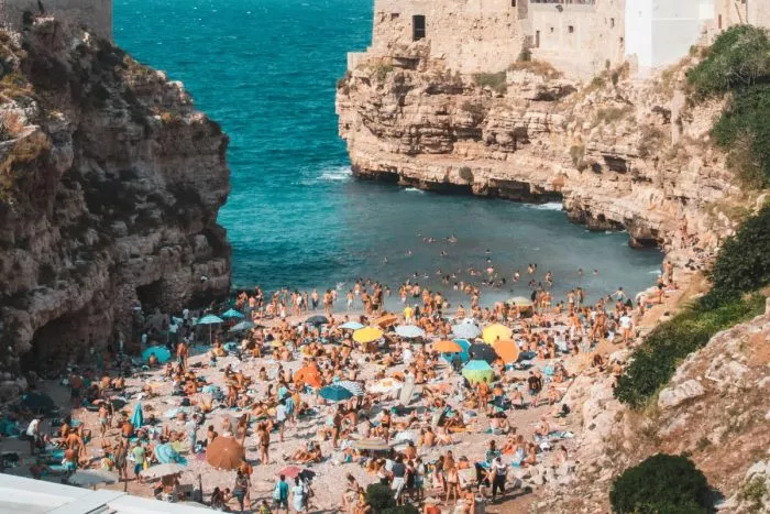 Polignano a Mare: 15 Best Things to Do and See 6 In the summer, the famous beach is head to head.