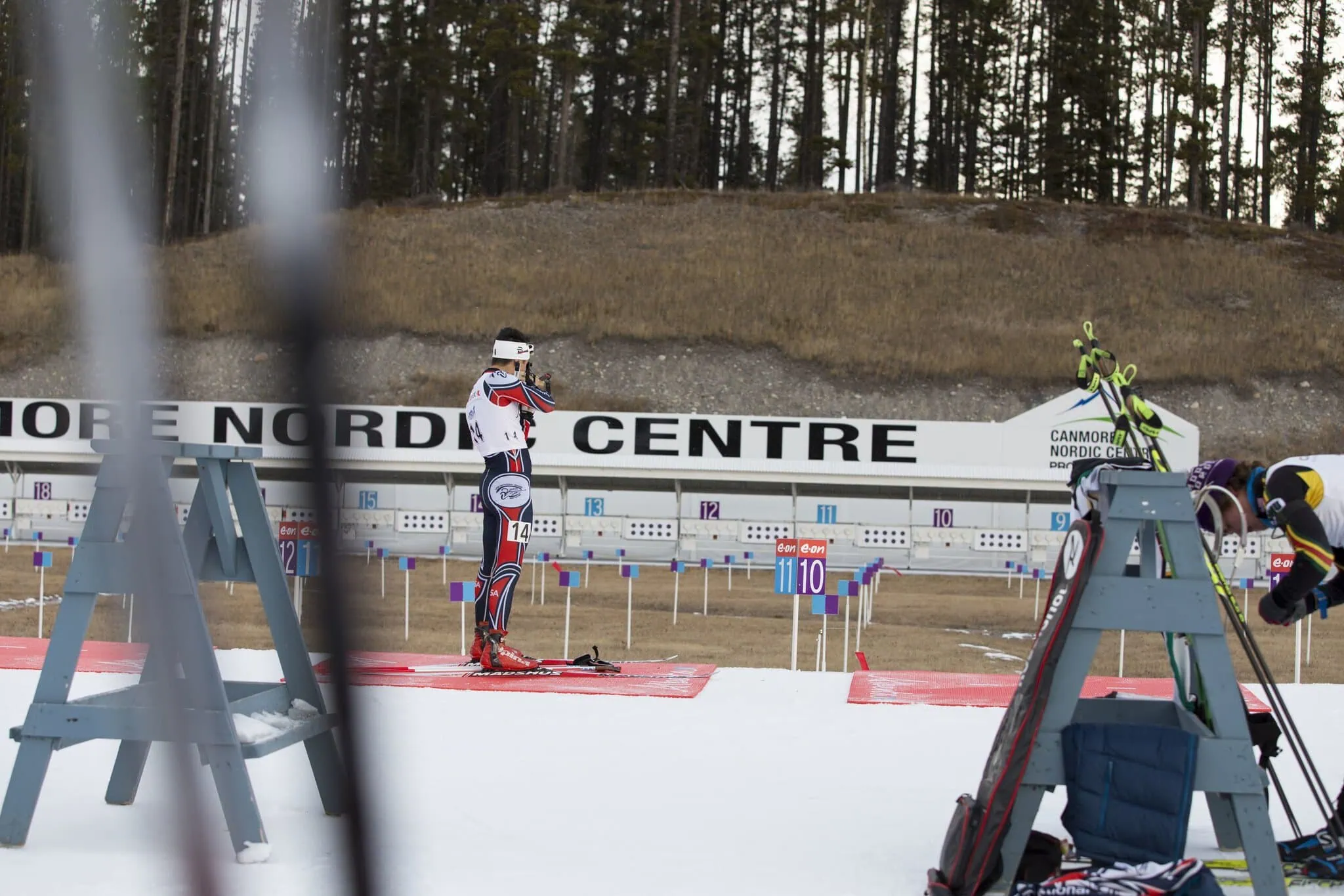 Biathlete at the shooting range in Canmore Nordic Centre