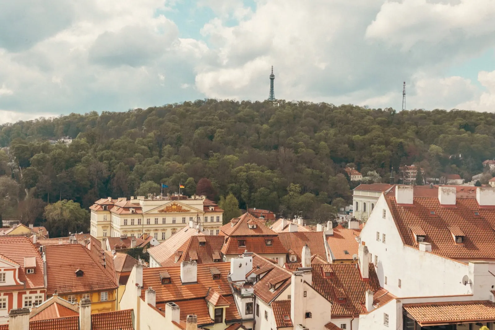 The Most Beautiful Gardens and Parks in Prague: 15 Tips for a Walk (2026) 6 Petřín Lookout Tower on the green Petřín Hill above the rooftops of Malá Strana