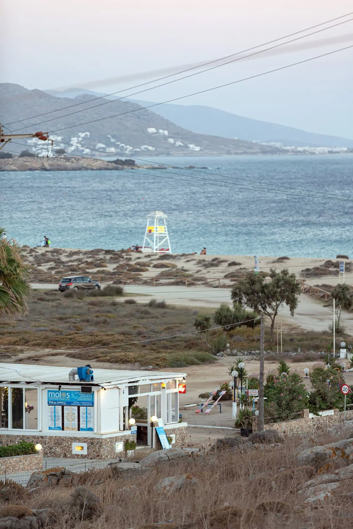 Beach taverna in the resort of Agios Prokopios at dusk