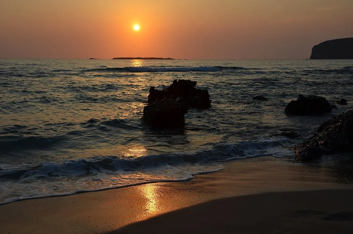 Wide sandy beach of Falassarna in western Crete with turquoise sea