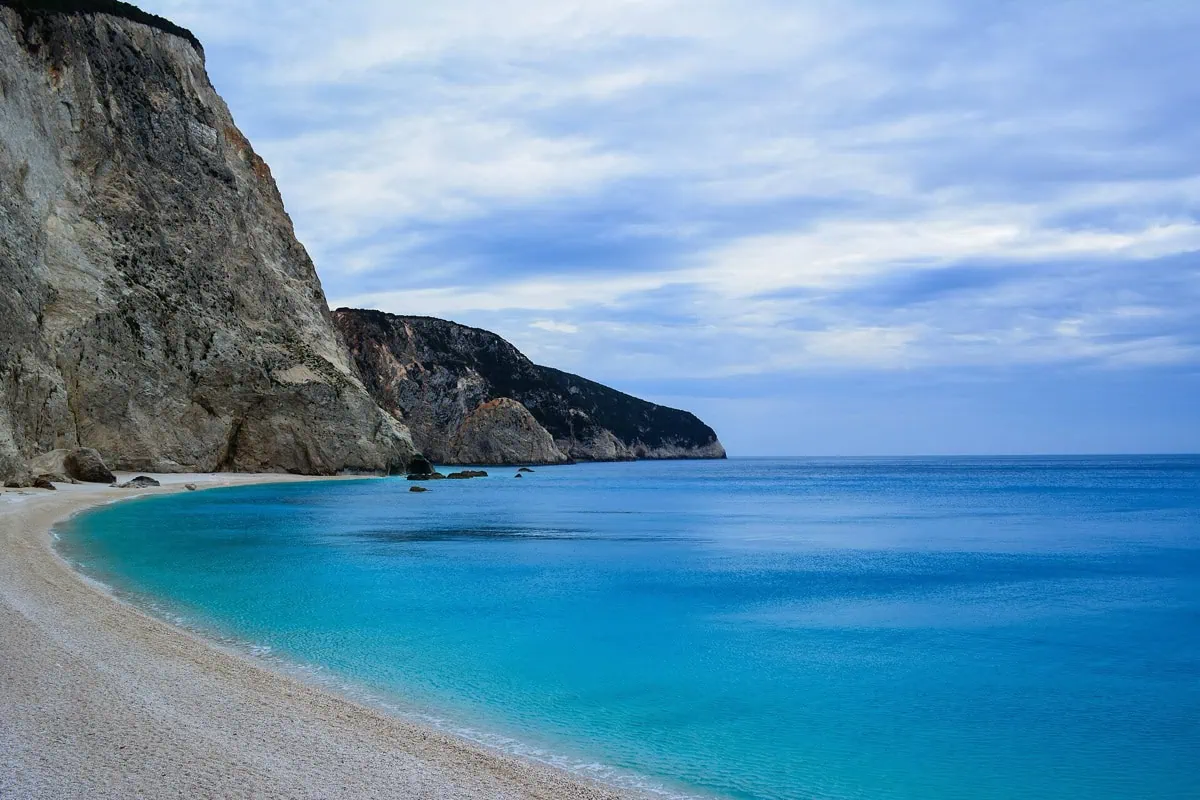 Porto Katsiki beach on Lefkada with a towering white cliff and turquoise sea