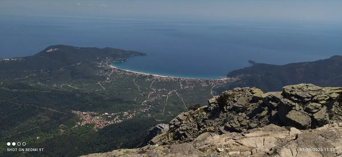 Golden Beach on Thassos island seen from Mount Ipsarion, a long golden strip of sand in a bay