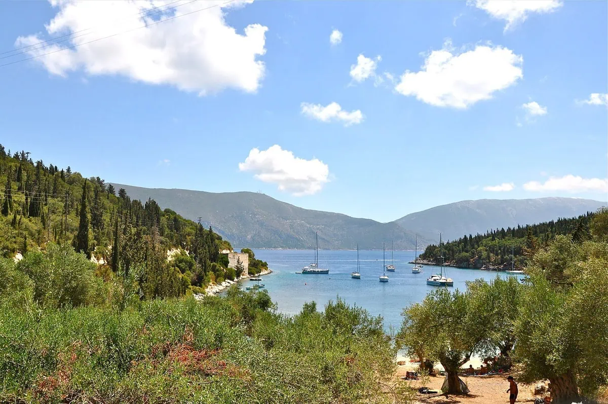 Green coastline of the Ionian island of Kefalonia with a sea channel towards Ithaca
