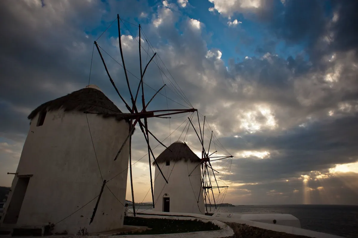 Iconic windmills on the island of Mykonos in the Cyclades overlooking the Aegean Sea