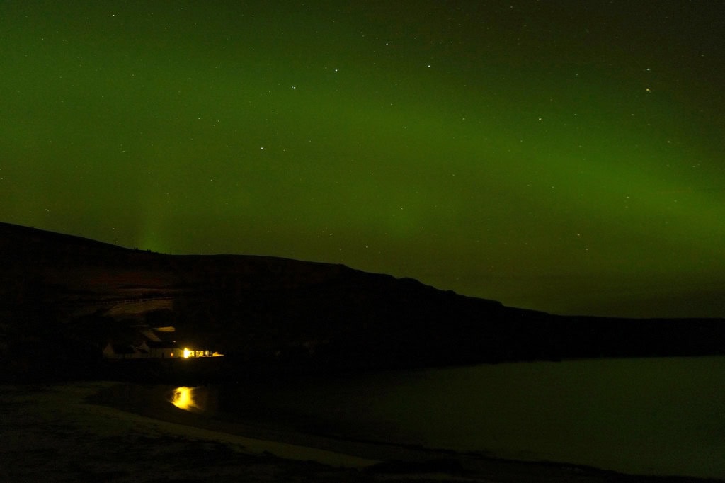 Aurora boreală: unde și când o vezi (12 cele mai bune locuri) 12 Aurora boreală deasupra nordului Scoției (Insulele Shetland)