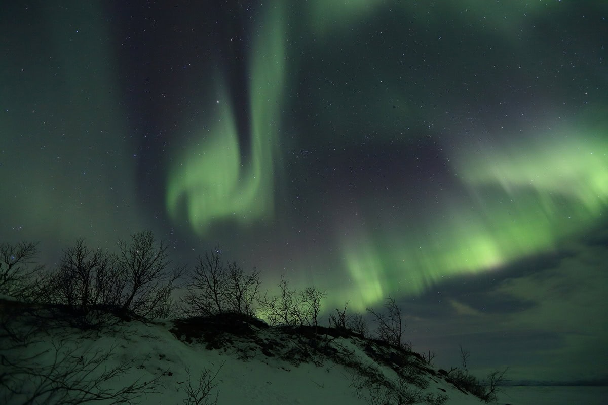 Aurora boreală: unde și când o vezi (12 cele mai bune locuri) 7 Aurora boreală lângă Abisko și lacul Torneträsk din Suedia