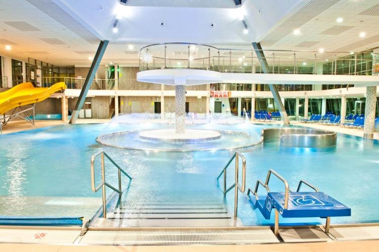 Best Aquaparks in Slovakia: 8 Spots to Visit with Kids in 2026 10 Indoor pool with a slide at AquaRelax Dolný Kubín