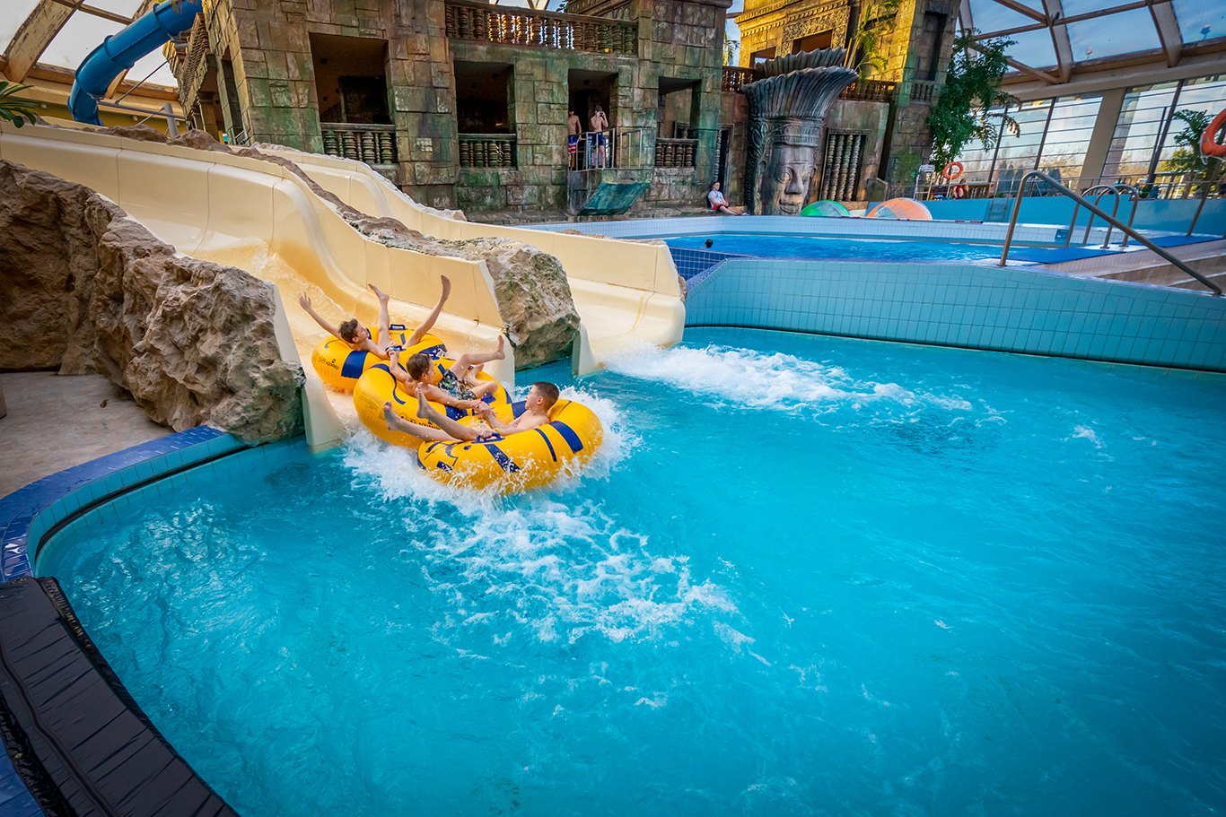 Best Aquaparks in Hungary: 13 Top Picks for 2026 2 Yellow slide under the dome at Aquaworld Budapest