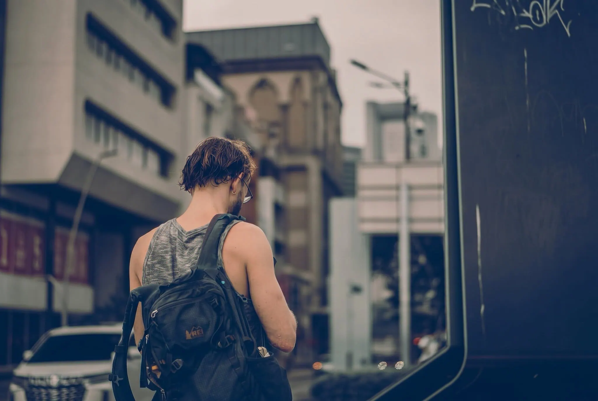 Cabin Backpack 2026: Best Carry-On Backpacks by Size 5 Traveller with a carry-on cabin backpack exploring the city