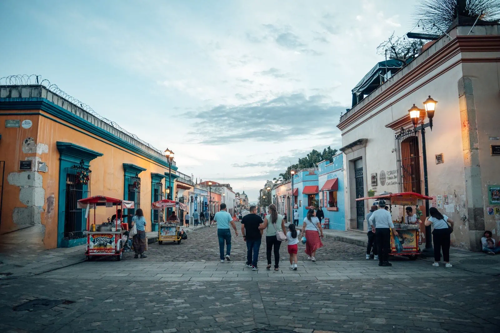 Mexico Holidays: 20 Best Places to Visit & See in 2026 8 An evening street in Oaxaca