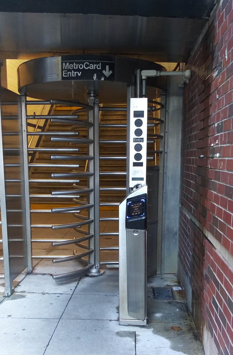 New York Transportation 2026: Subway (OMNY) and Getting From the Airport 46 A New York subway turnstile with an OMNY contactless reader