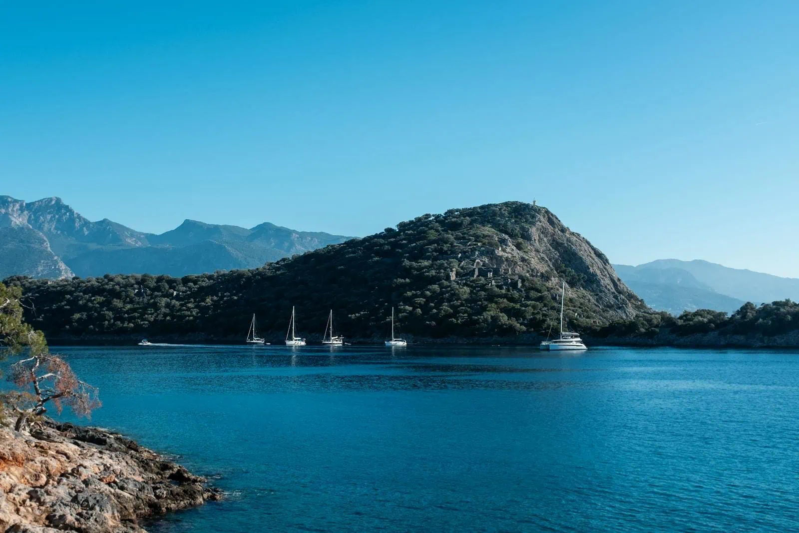 Fethiye en Ölüdeniz in Turkije: Blue Lagoon en paragliden — 12 tips voor 2026 13 Strand van Ölüdeniz en Belcekız