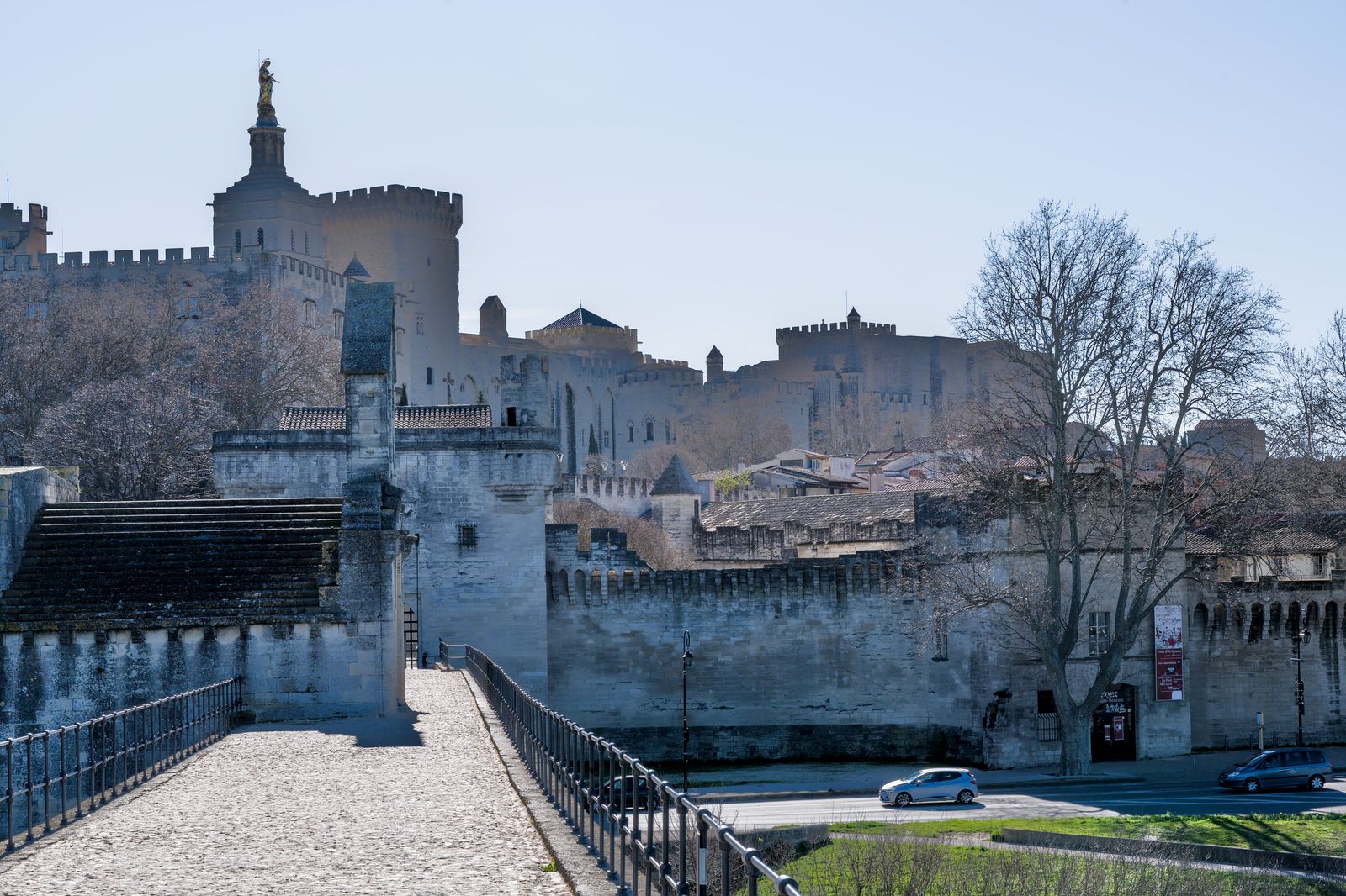 France Holidays: 30 Best Places to Visit in 2026 19 The Papal Palace and bridge in Avignon