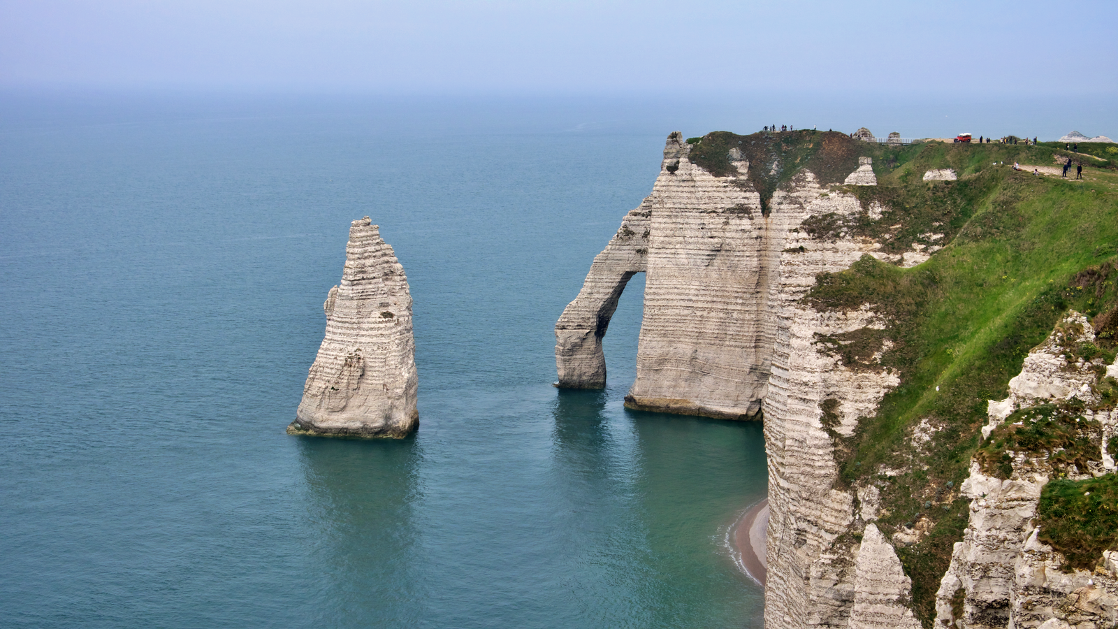 France Holidays: 30 Best Places to Visit in 2026 7 The chalk cliffs at Étretat in Normandy