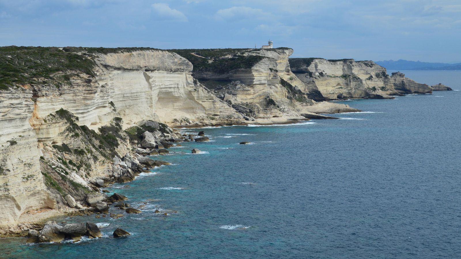 France Holidays: 30 Best Places to Visit in 2026 31 Cliffs and sea on Corsica near Bonifacio