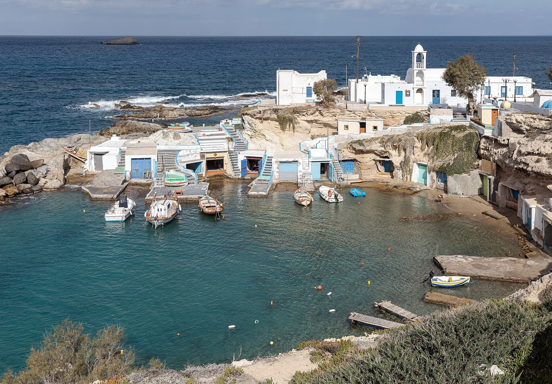 The fishing village of Mandrakia with its syrmata boathouses and little chapel