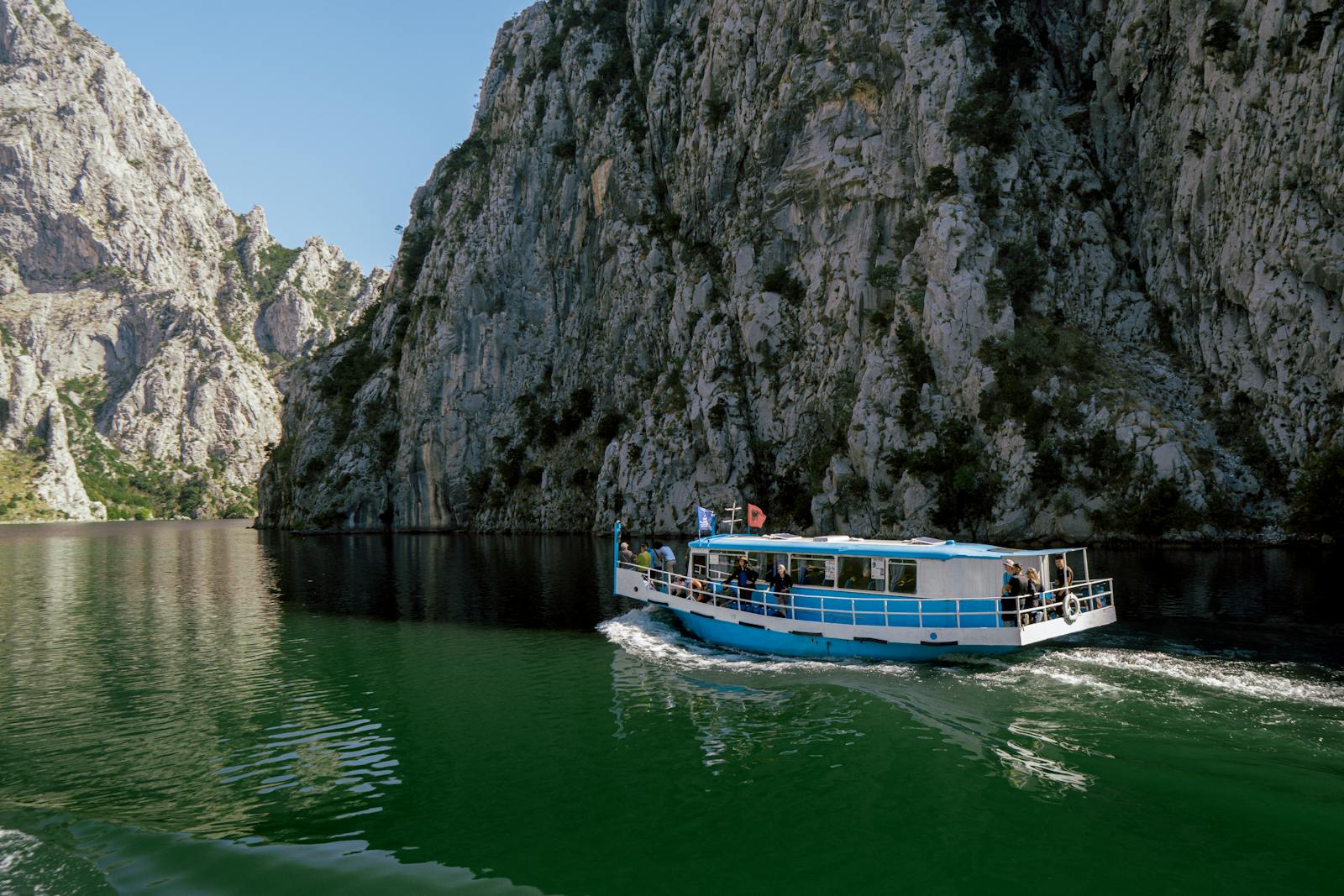 Accursed Mountains Albania: 10 Tips for Theth, Valbona & the North 2026 5 The ferry on Lake Koman between steep rock walls
