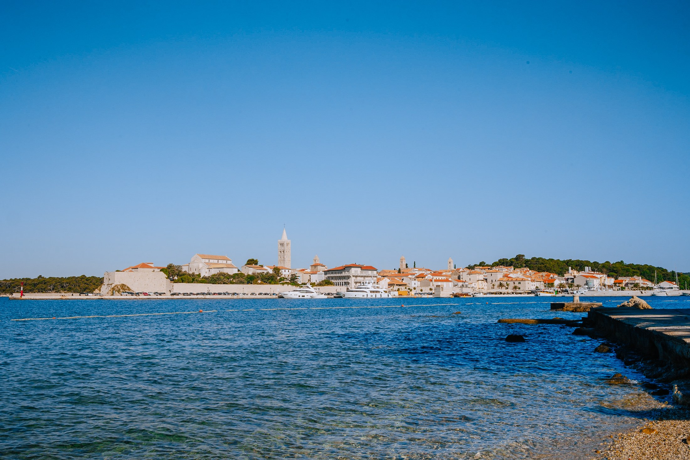 Rab Island, Croatia: 11 Best Things to See and Do in 2026 5 Coastline of Rab island with terracotta rooftops