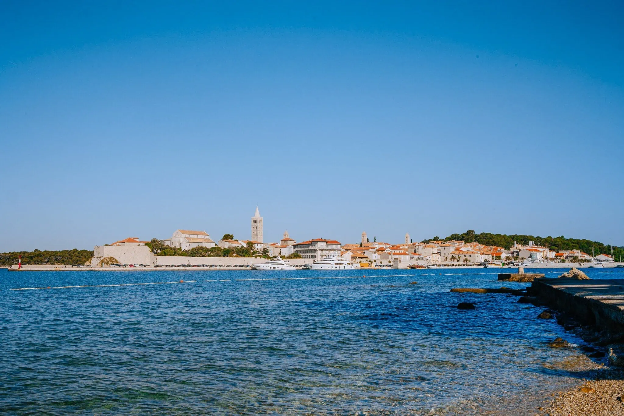 Rab Island, Croatia: 11 Best Things to See and Do in 2026 5 Coastline of Rab island with terracotta rooftops
