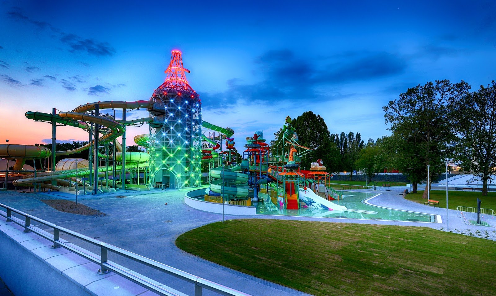 Best Aquaparks in Hungary: 13 Top Picks for 2026 7 Illuminated slide tower at Rába Quelle Győr