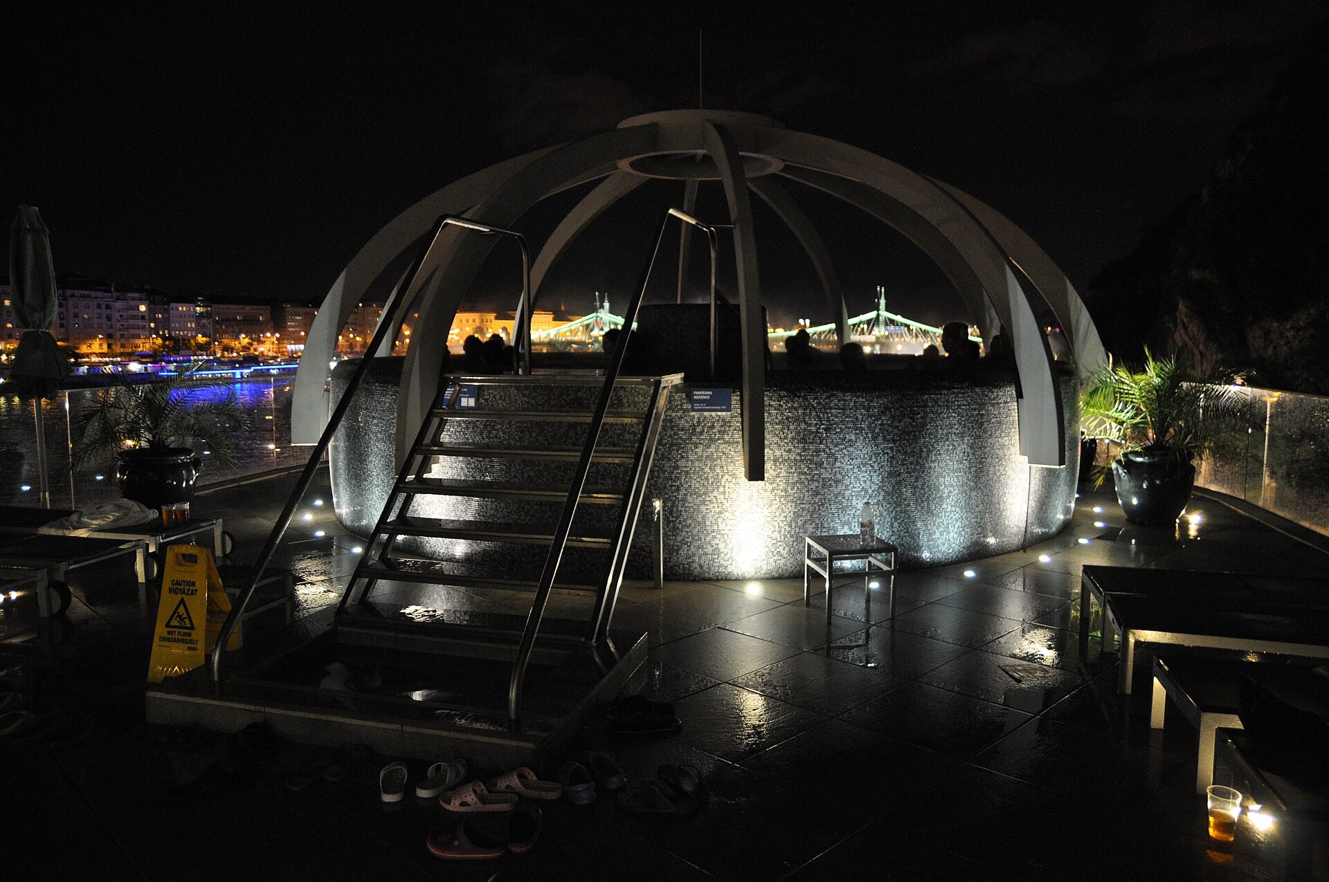 Budapest Thermal Baths: 8 Best Spas + Practical Guide for 2026 119 Rooftop panoramic hot tub at the Rudas baths overlooking the Danube at night