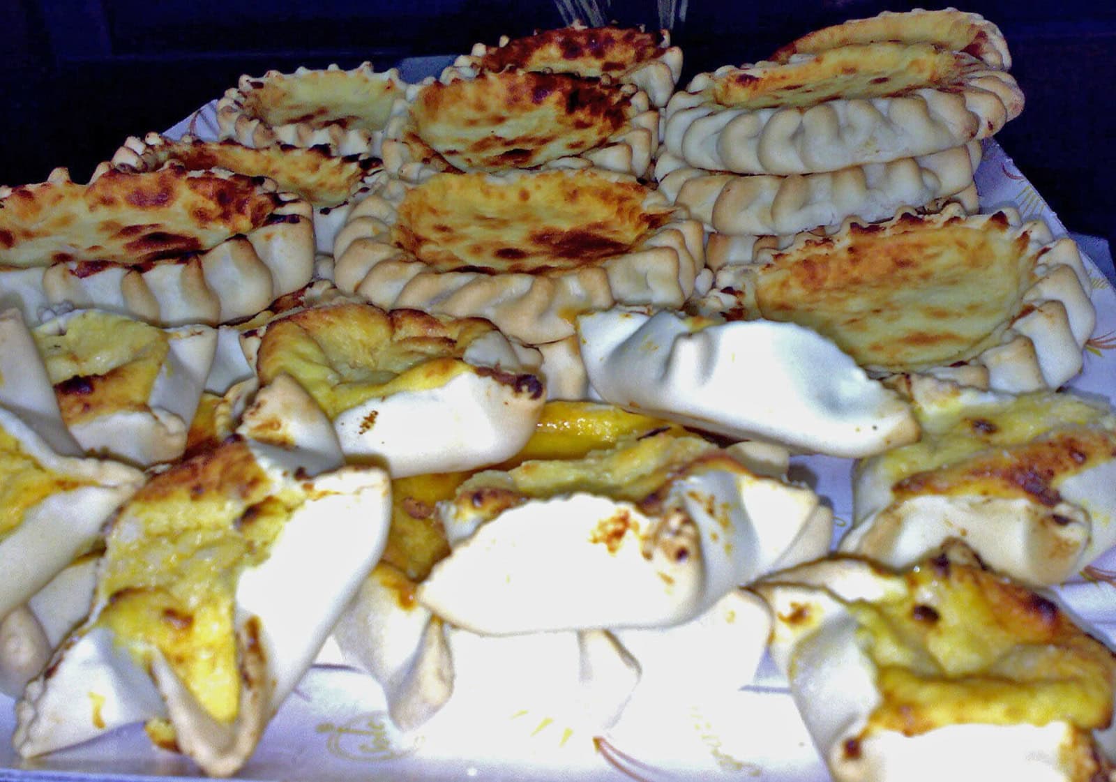 Bucătăria din Sardinia, Italia: 12 specialități de gustat în 2026 13 Coșulețele sarde de Paște pardulas cu ricotta