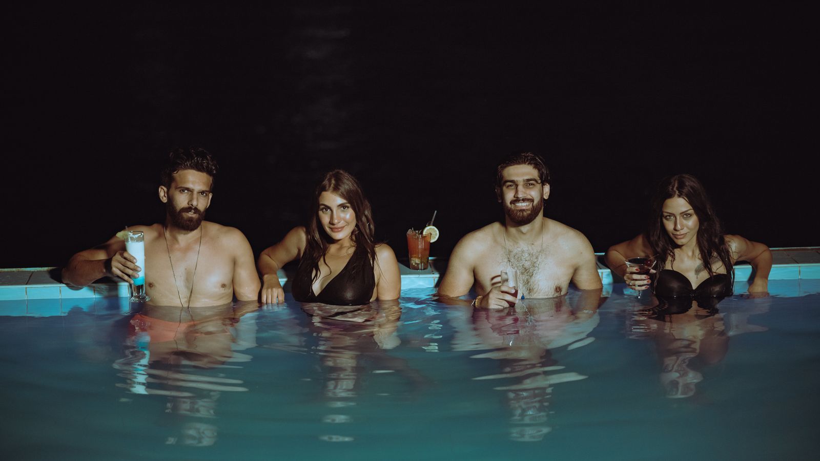 Budapest Thermal Baths: 8 Best Spas + Practical Guide for 2026 124 Nighttime pool party with cocktails