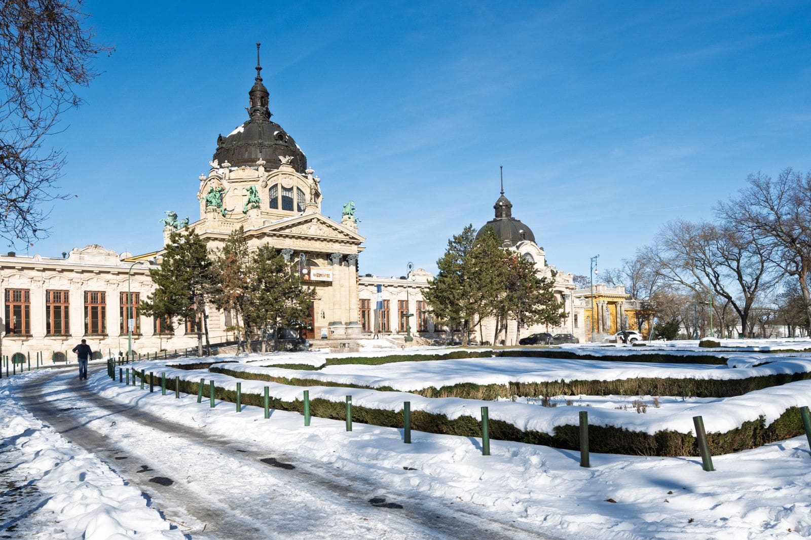 Budapest Thermal Baths: 8 Best Spas + Practical Guide for 2026 115 Széchenyi thermal baths in a snow-covered City Park in winter