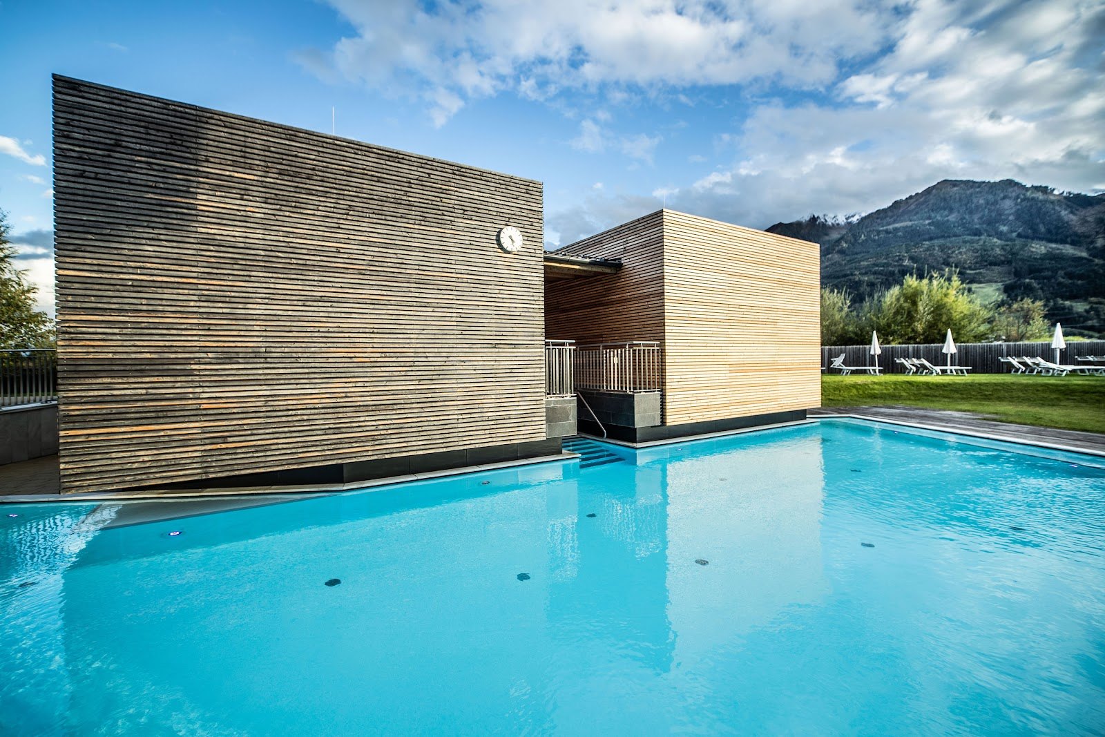 The Best Thermal Spas in Austria: 13 Spots to Visit in 2026 6 Outdoor pool at Tauern Spa with mountain views near Kaprun