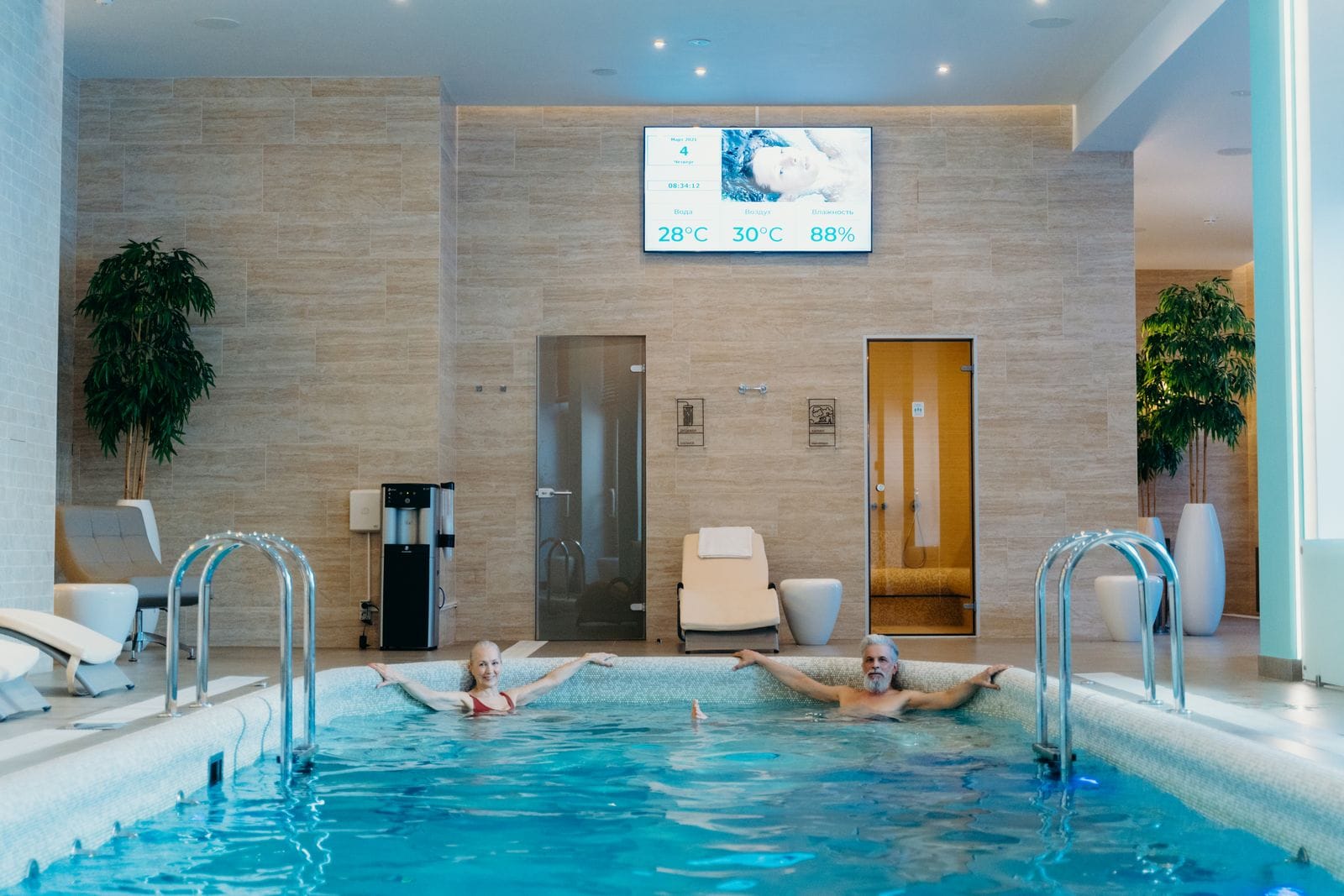 Budapest Thermal Baths: 8 Best Spas + Practical Guide for 2026 127 Interior of a modern thermal pool with temperature signs