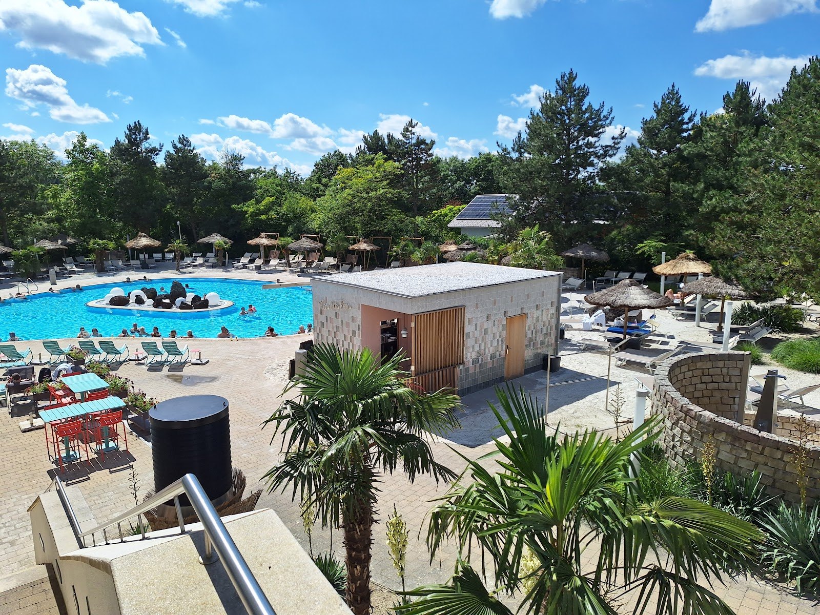 The Best Thermal Spas in Austria: 13 Spots to Visit in 2026 14 Caribbean lagoon with palm trees at Therme Geinberg