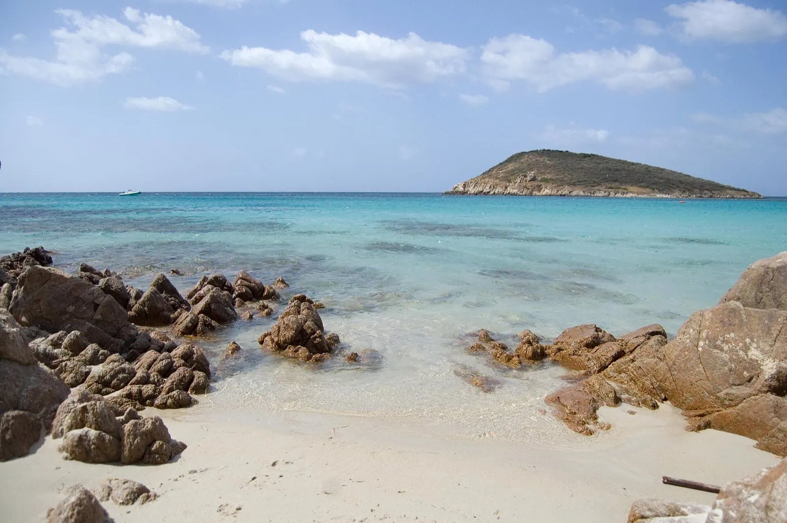 The Most Beautiful Beaches in Sardinia: 16 Best Coves for 2026 7 Tuerredda beach with its little island in southern Sardinia