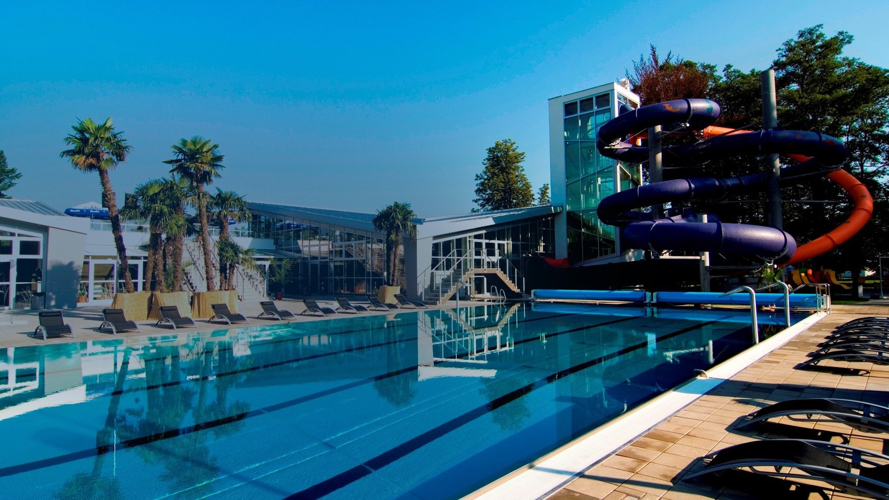 Best Aquaparks in Slovakia: 8 Spots to Visit with Kids in 2026 6 Outdoor pool with slides at Spa & Aquapark Turčianske Teplice