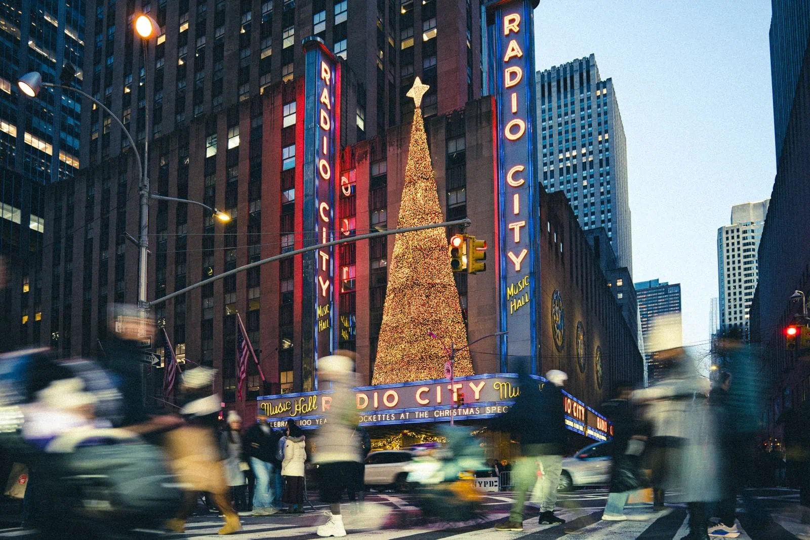 New York in Winter: 12 Things You Must Do in 2026 1 Radio City Music Hall and a Christmas tree in festive New York