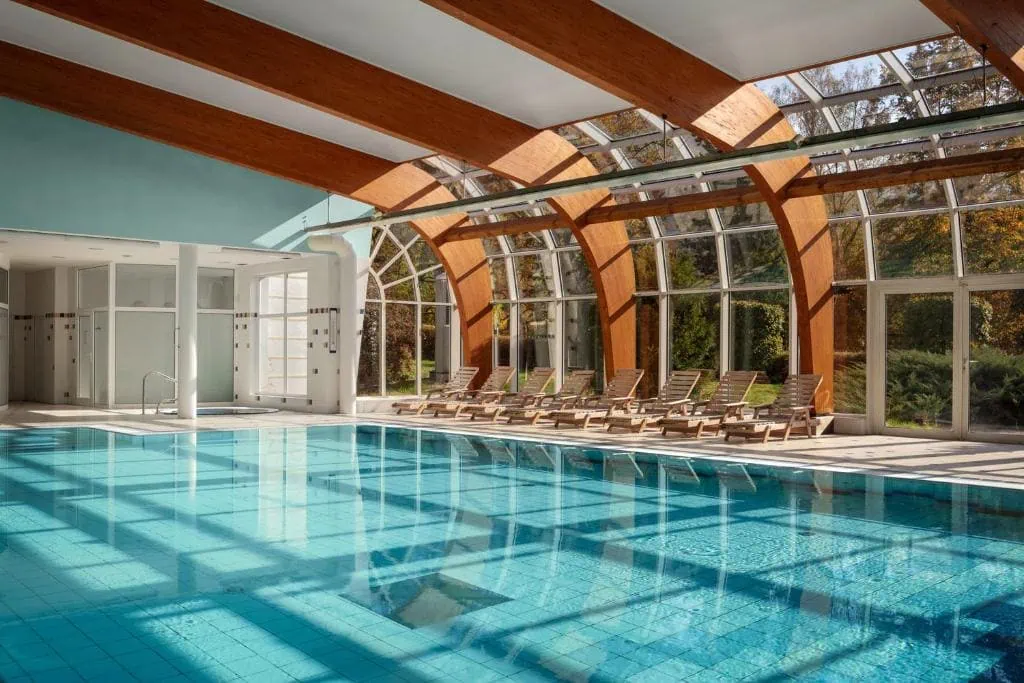 Indoor pool under a glass dome at Spa Resort Sanssouci in Karlovy Vary