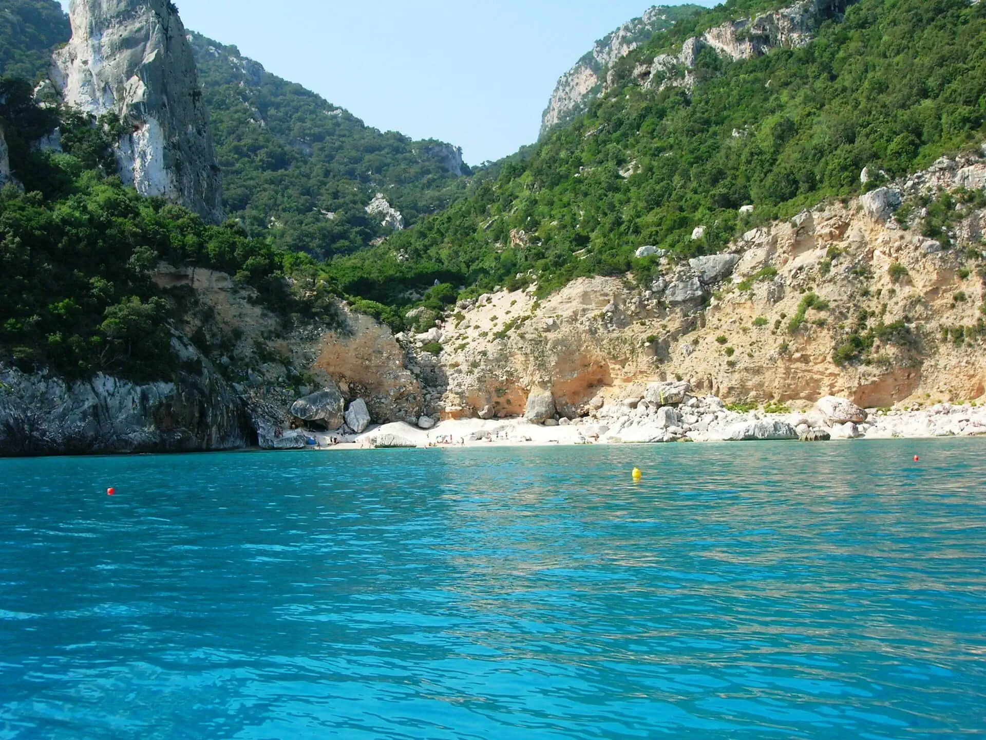 Sardinia, Italy: 25 Best Things to See and Do in 2026 8 Cala Goloritzé beach with its limestone spire