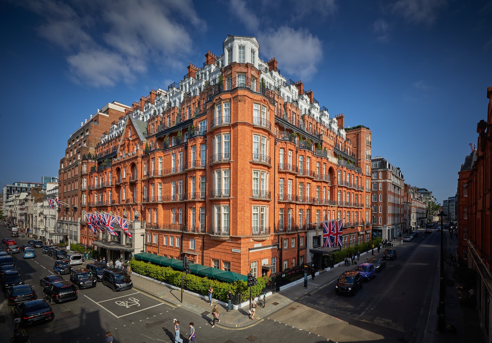 The World's Most Luxurious Hotels: 29 Addresses That Will Surprise You in 2026 24 Art Deco entrance to London's Claridge's
