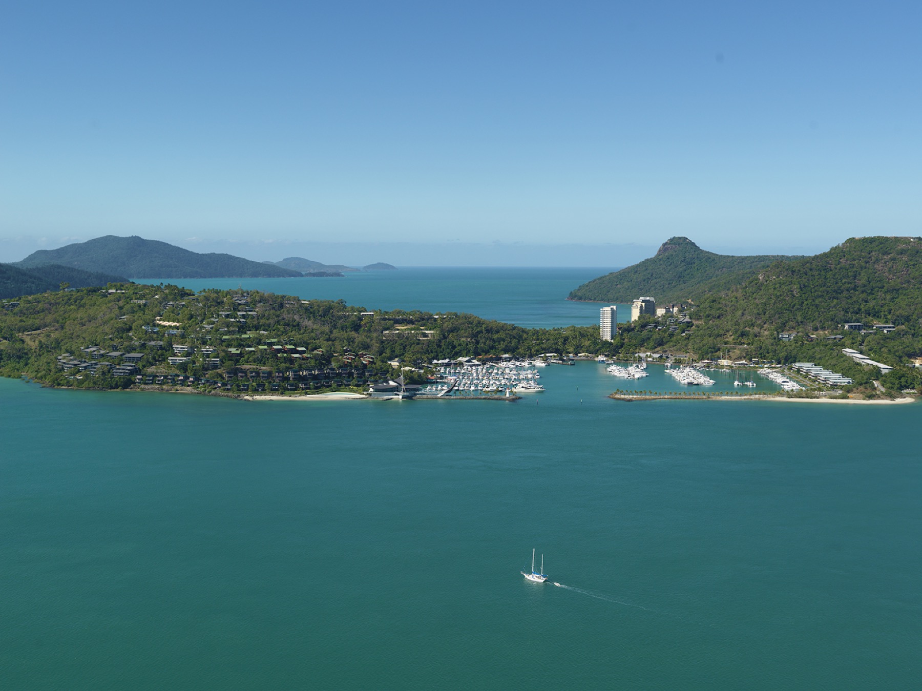 Where to Stay on the Great Barrier Reef in 2026: 12 Islands 21 Marina and boats in the Whitsundays archipelago