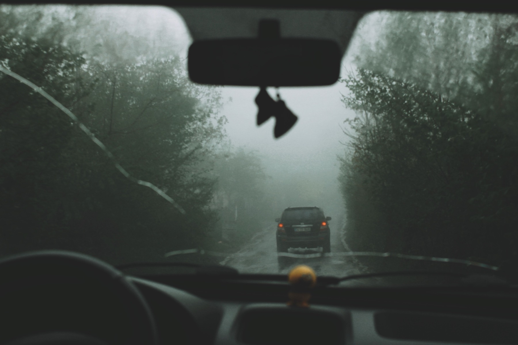 Austria Vignette 2026: Price, Where to Buy & the End of Sticker Vignettes 4 View through a car windscreen onto the road