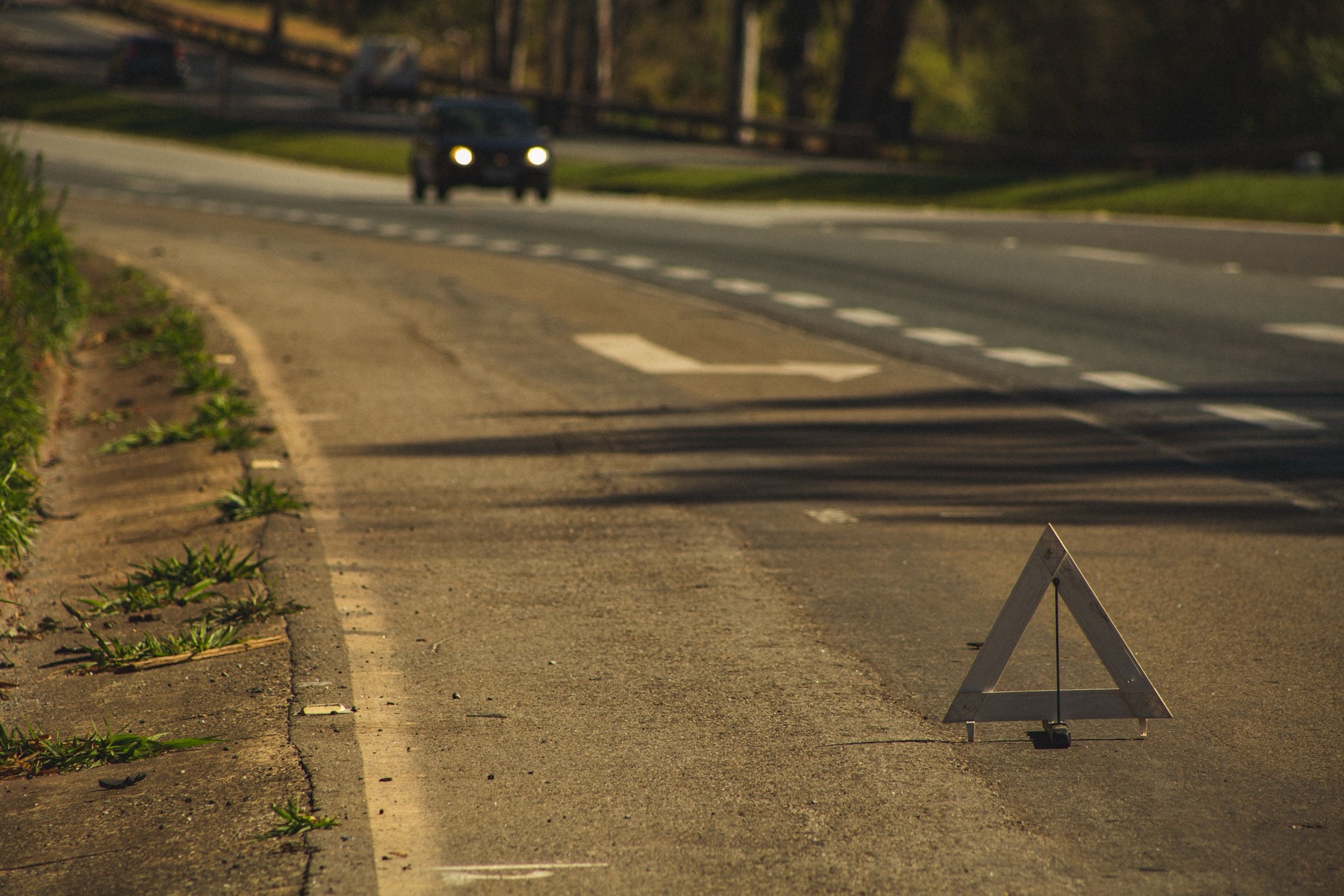 Austria Vignette 2026: Price, Where to Buy & the End of Sticker Vignettes 12 Warning triangle next to a vehicle