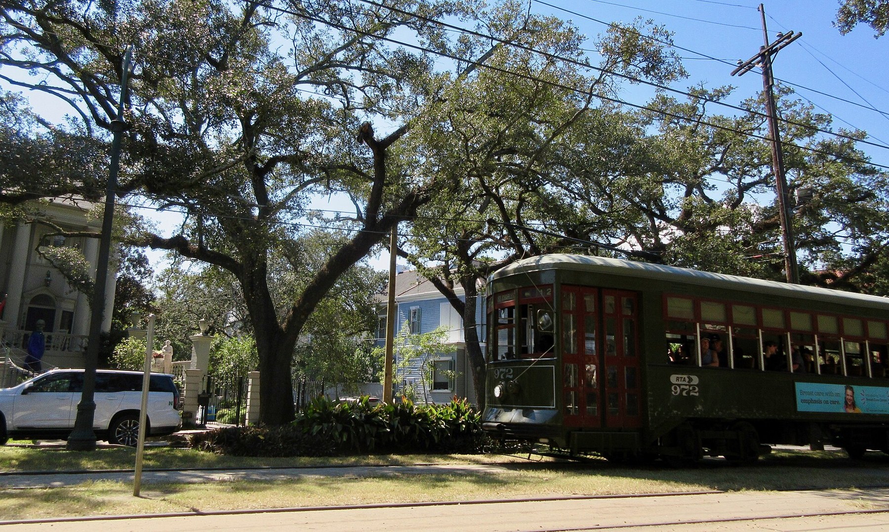 Things to Do in New Orleans: 18 Must-See Spots 13 Historic streetcar on St. Charles Avenue in New Orleans