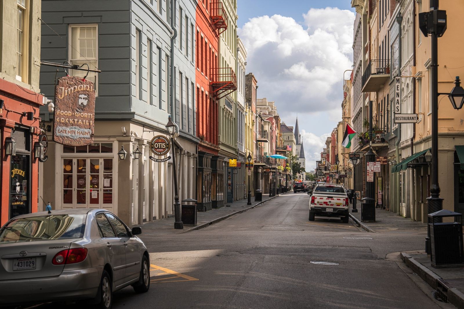 Things to Do in New Orleans: 18 Must-See Spots 1 Colorful historic houses on a street in the French Quarter of New Orleans