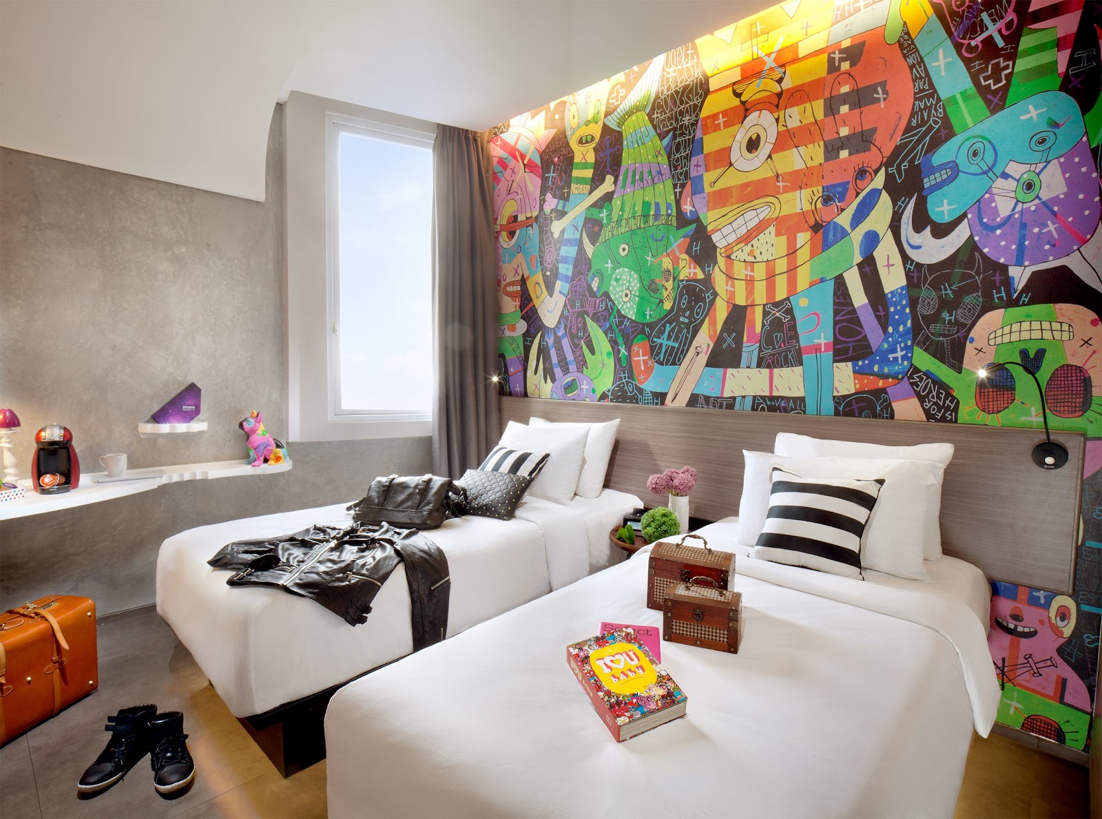Where to Stay in Jakarta: 18 Hotels and Districts in 2026 8 Room with mural at ARTOTEL Thamrin hotel