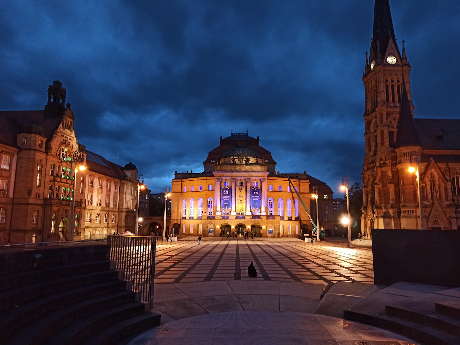 Chemnitz Christmas Market 2026: Pyramid & Bergparade 4 Theaterplatz in Chemnitz at night with the opera house and St. Peter's Church